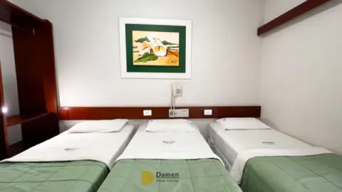 Quarto Triplo Standard - Damen Hotel Center
